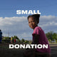 Young girl in a pink shirt sitting outdoors with 'SMALL DONATION' text overlay.